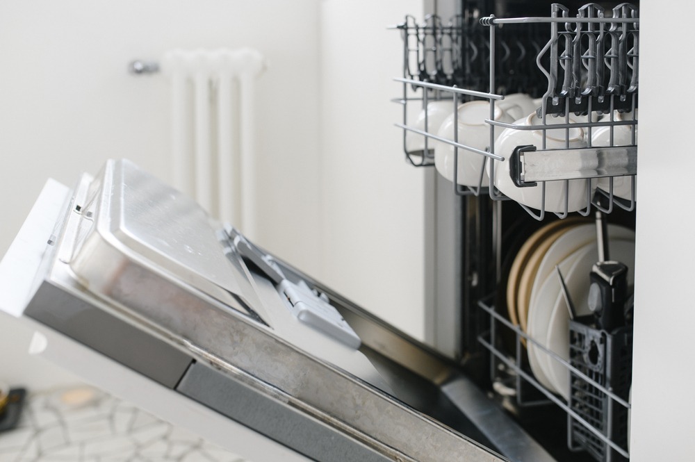 Dishwasher draining into sink deals