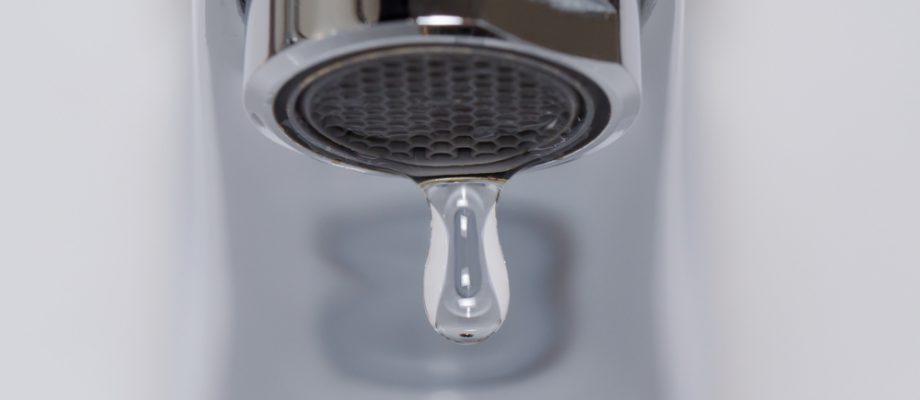 What Should You Do with a Kitchen Faucet Leaking from the Base of the Spout?