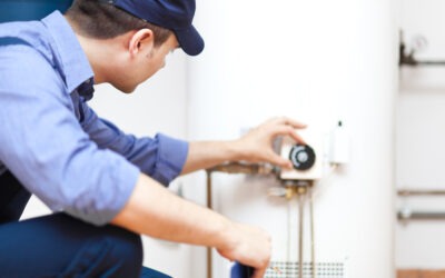 repairman handling water heater